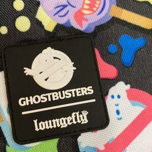 Loungefly Ghost Buster crossbody purse. Colorful ice cream/candy characters